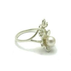 Sterling silver ring 925/1000, flower. Stamped 925.Approximate weight 3.6 grams. Top width 2.0cm (0.80inches). All our jewels are made from solid sterling silver 925/1000 and are carefully crafted by hand in our family workshop. We dispatch your orders in 5 working days, worldwide and the postage is $5. We ship registered priority mail. Please allow 5-7 working days for delivery in Europe and 10-15 working days outside Europe. For any questions - please do not hesitate to contact me! Elegant Silver Diamond Flower Ring, White Gold Flower Ring Stamped 925, Sterling Silver Flower Ring For Wedding, Hallmarked Sterling Silver Flower Ring For Anniversary, Hallmarked White Gold Flower Ring, Classic Sterling Silver Flower Ring For Gift, Elegant Flower Shaped Ring Stamped 925, White Sterling Silver Flower Ring, Formal Flower Ring Stamped 925