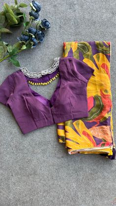 Product Descriptions : Purple silk JEWEL NECK patterned blouse with intricate heavy hand worked Jewel neck works for neck as shown. Note : saree is not included with this product View this post on Instagram A post shared by Handcrafted Sarees by Shobana Nithin (@threadslabel_india) Neck Hand Work, Yellow Blouse Designs, Blouse Handwork, Blouse Works, Sarees For Girls, Wedding Saree Blouse Designs, Sari Blouse Designs, Blouse Designs Indian, Patterned Blouse