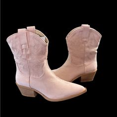 Step Out In Style With These Stunning Mi.Im Claire Ankle Boots. The Pink Suede Upper Material And Soft Suede Lining Is Beautifully Accented With Delicate Embroidery For A Unique And Fashionable Look. The Slip-On Style Features A Pointed Toe And Block Heel, Making Them Comfortable And Functional For Everyday Wear. These Boots Are Perfect For The Modern Woman Who Wants To Make A Statement With Her Shoes. The Ankle Height And Pull-On Closure Make Them Easy To Wear, While The Cowgirl Character Adds Pink Embroidered Boots For Spring, Spring Embroidered Almond Toe Boots, Spring Ankle-high Western Boots, Pink Western Boots With Pointed Toe, Western Ankle-high Spring Boots, Pink Pointed Toe Mid-calf Boots For Winter, Western Ankle-high Boots For Spring, Pink Embroidered Round Toe Boots, Pink Embroidered Spring Boots