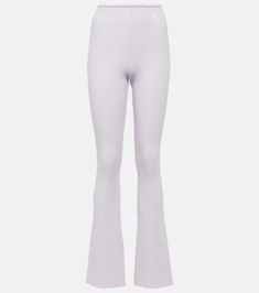 Reedition ribbed-knit flared pants in white - Courreges | Mytheresa Elegant Ribbed Stretch Bottoms, Stretch Ribbed Wide Leg Pants, Chic Ribbed Flare Bottoms, Elegant Stretch Ribbed Pants, Stretch Ribbed Wide Leg Pants Full Length, Chic Full-length Ribbed Wide Leg Pants, Flare Ribbed Pants For Loungewear, Ribbed Flare Pants For Loungewear, Stretch Ribbed Wide-leg Pants