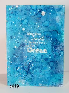 a blue greeting card with the words may your love be the deep ocean on it