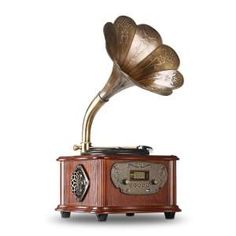 an old - fashioned record player is shown with its horn on it's stand