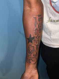 a person with a tattoo on their arm