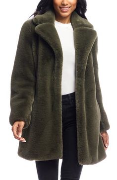 Layer up for colder weather without compromising on glamour in a cozy notch-collar jacket crafted from luxuriously plush faux mink fur. 32" length Front hook-and-eye closure Notched collar Side-seam pockets Lined, with 100% polyester fill 100% polyester faux fur Machine wash, line dry Imported Faux Fur Coat Nordstrom, Cozy Fur Coat With Pockets, Chic Faux Fur Coat With Pockets, Chic Solid Faux Fur Outerwear, Fabulous Furs, Mens Scarves, Suit Accessories, Faux Fur Jacket, Fur Jacket