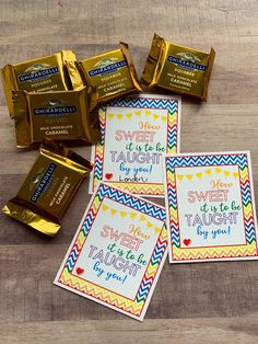 candy bar wrappers with some sayings on them and gold foil wrapped around them