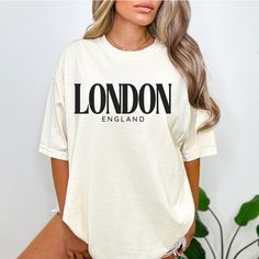 Thank You For Shopping With US🤍🤍🤍🤍 Celebrate one of the world's most iconic cities with our Classic London England T-Shirt! Perfect for all London lovers, this tee perfectly combines comfort and style. Made of, 6.1 oz., 100% ring spun USA cotton, this graphic tee is has a comfortable and breathable feel. Ideal for everyday wear or as a cherished souvenir. Whether you’ve traveled to London and want a keepsake, or simply love the spirit and history of the city, our Classic London England T-Shi Holiday Collection, London England, Graphic Tee, The City, Everyday Wear, Graphic Tees, England, London, Boutique