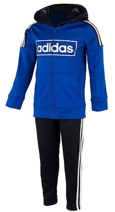 Adida's Boys 2 Piece sweater/pant Set   Color: Royal Blue/ Black  Material:  100% Polyester Country of Manufacture: Vietnam Features: Long Sleeve  Full Zip Up Front Hooded Elastic Waist and Cuffs on Pants Two Front Pockets on Jacket Sweater  Size 2T 3T 4T 5 6 7 Neck 16" 16" 16" 18" 18" 18" Shoulders 11" 11" 11.5" 12.5" 13" 13.5" Chest 26" 27" 29" 30" 31" 32" Sleeve  11.5" 11.5" 13" 14" 14" 15" Total Length 16" 17" 18" 19" 20" 21" Pants Size 2T 3T 4T 5 6 7 Waist 18" 19" 19" 20" 20" 21" Rise 9" 9" Winter Adidas Activewear With Three Stripes, Adidas Long Sleeve Tracksuit, Adidas Long Sleeve Tracksuit Sportswear, Adidas Sportswear Tracksuit, Blue Activewear For Jogging With Three Stripes, Blue Adidas Activewear For Jogging, Adidas Sporty Long Sleeve Tracksuit, Sporty Adidas Tracksuit, Casual Adidas Tracksuit For Sports