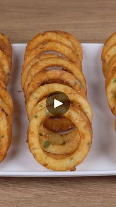 some onion rings on a white plate