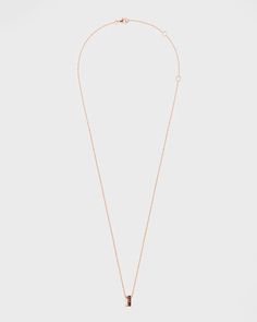 A soft line of rose gold, a sculpted brown PVD ring, two of the Quatre collection's signature codes forming a delicate pendant that only asks to be completed by its other half, as a romantic pact of love..Boucheron pendant necklace.18-karat yellow and pink gold.Brown PVD.Pendant length: 45 cm.Adjustable length.Lobster clasp.Wipe with a clean, dry cloth.Boucheron Style # JPN00648 About the Collection: Quatre collection: a graphic and strong design, to reveal every facets of women personalities. W Boucheron Jewelry, Rose Gold Brown, Delicate Pendant, Woman Personality, Yellow And Pink, Other Half, Mini Pendant, Personalities, Free Jewelry