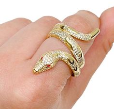 MY GOLD SOURCE 14k Gold Fancy CZ Snake with Scales and Red Eyes Ring Size 8.75 PRODUCT DETAILS - METAL: 14K YELLOW GOLD (100% Authentic) - CONDITION: NEW -STONE: CUBIC ZIRCONIA -RING FINGER SIZE: 8.75 -APPROX. WEIGHTS: 7.0 grams This is a Stunning Real 14K Yellow Gold Fancy Snake with Scales Ring! It is Extremely Fashionable and dainty. -note all weights and dimensions are approximate- -Refer to image to see details- -Returns accepted within 30 Days after receiving the item- MY GOLD SOURCE Gold Ruby Rings With Pave Setting, Gold Ruby Jewelry With Pave Setting, Party Yellow Gold Jewelry With Pave Setting, Snake-shaped Diamond Jewelry For Anniversary, Diamond Snake Shape Jewelry For Anniversary, Snake Shape Diamond Jewelry For Anniversary, Luxury Gold Snake Ring For Anniversary, Gold Ruby Ring Stamped 14k, Yellow Gold Diamond Ring In Snake Shape