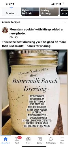 a jar of butter sitting on top of a wooden table