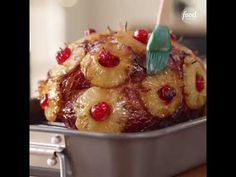 a pineapple upside down cake in a pan with a toothbrush sticking out of it