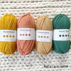 three balls of paintbox yarn in various colors