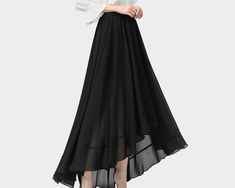 * A beautiful chiffon skirt, have 2 layers, one layer chiffon and one layer lining, not sheer at all. * Quality pearl chiffon fabric, soft, breathing and easy care. * Asymmetrical hem, it moves very beautifully when you walk. * Support 7 days return to get full refund on item without any reason. * Can custom size and colors, lead time is 6-8 days; * Let us know your usual size in your country and your overall height. * If you have some specific request or special characters such as broad shoulde Chiffon Tiered Party Skirt, Party Tiered Chiffon Skirt, Elegant Ruffled Maxi Skirt With Asymmetrical Hem, Summer Evening Draped Skirt With Lining, Long Draped Skirt For Summer, Chiffon Tiered Skirt For Party, Tiered Chiffon Skirt For Party, Flowy Chiffon Maxi Skirt With Tulle, Elegant Gathered Skirt With Asymmetrical Hem