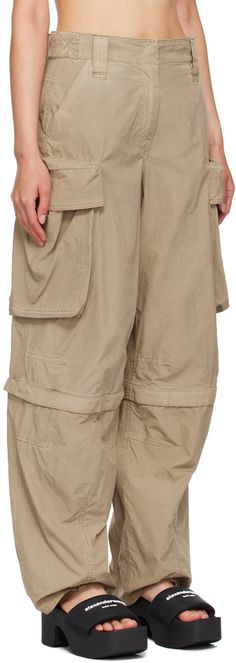 Oversized polyester- and nylon-blend taffeta cargo pants. · Belt loops and velcro tabs at waistband · Four-pocket styling · Zip-fly · Logo printed at front · Detachable zip panel at legs for alternate styling · Cargo pocket at outseams Supplier color: Safari Luxury Khaki Utility Jacket For Streetwear, Luxury Khaki Cargo Pants For Workwear, Cargo Pants In Store, Cheap Beige Parachute Pants For Streetwear, Luxury Nylon Vest For Streetwear, Luxury Khaki Parachute Pants With Pockets, Luxury Brown Wide Leg Cargo Pants, Luxury Techwear Parachute Pants With Multiple Pockets, Luxury Cotton Outerwear With Cargo Pockets