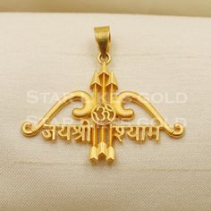 This intricately crafted gold pendant is a standout piece, designed with meticulous attention to detail. Its unique design and polished finish make it a perfect addition to any necklace, offering a personal touch and a touch of elegance. 22k Gold Pendant Handmade Jewelry,  Metal is Real Gold Purity is 22kt Weight is 5.18 grams approx Full Length is 3.3 cm long approximately Full Width is 3.6 cm wide approximately Please feel free to ask if you have any query. Return and cancellation-  a 20% rest Khatu Shyam Ji, Khatu Shyam, Jewelry Metal, Handmade Charms, Pendant Design, Pure Gold, 22k Gold, Real Gold, Gold Pendant