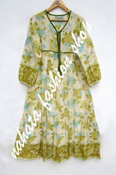 ITEM DESCRIPTION summer cotton flower printed long maxi dress - v neckline with tassel boho dress - long sleeve casual wear maxi   Features: Long sleeve, V neck, Long dress Fabric : 100% Cotton Voile screen printed fabrics  Sleeve Length = 22 inch For more sizes & their measurement, please refer our below chart to understand the sizes variations available with us For your size requirement, please mention your size in seller note at the time of buying. SIZE MEASUREMENT  BUSTLENGTHSHOULDER XXS34 inch51 inch13.5 inch XS36 inch51 inch14 inch S38 inch51 inch14.5 inch M40 inch51 inch15 inch L42 inch51 inch16 inch XL44 inch51 inch16.5 inch 2XL46 inch51 inch17 inch 3XL48 inch51 inch18 inch   Company Return Policy:  Please write for more information to my email directly CHOOSE "ASK SELLER QUESTION" Hippie Cotton V-neck Maxi Dress, Cotton V-neck Boho Hippie Dress, Green V-neck Hippie Maxi Dress, Bohemian Cotton Boho Dress With Tassels, Hippie Boho Cotton V-neck Dress, Spring Bohemian Boho Dress With Block Print, V-neck Boho Dress With Tassels In Hippie Style, Spring Bohemian Boho Dress With Tassels, Hippie Style Long Sleeve Cotton Maxi Dress