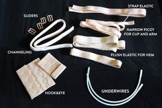 an assortment of different types of zippers and other sewing supplies on a black background