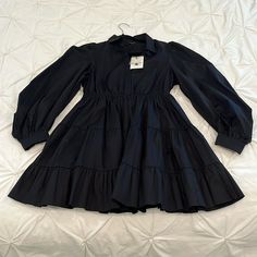 Brand New, Never Been Worn With Tags On Black Minidress From Bardot. Ruffle Skirt Below Wait And Button Up Above Waist To Collar With Puffed Sleeves. Tags Still On. Size Is Us 6/S, Which Is Eur 38 And Aus/Uk 10. 100% Cotton. Black Minidress, Bardot Dress, Puffed Sleeves, Ruffle Skirt, Puff Sleeve, New Dress, Button Up, Long Sleeve Dress, Mini Dress