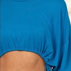 This Cute, Rounded Neck Crop Top Comes With An Adjustable Drawstring. Can Also Be Worn Over Your Bikini Swim Fitness And/Or Bralette Tops. Comes In Colors: Black Or Teal In My Shop New With Tags Comes From Smoke Free Home Stretch Cropped Top With Drawstring, Beach Top With Drawstring, Blue Vacation Top With Drawstring, Blue Drawstring Top For Vacation, Blue Stretch Tops With Tie Back, Blue Stretch Tie-back Top, Stretch Drawstring Tops For Beach, Fitted Blue Top With Drawstring, Black Crop Top Skirt