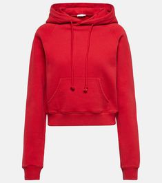 Timmi cropped cotton-blend jersey hoodie in red - The Row | Mytheresa Cropped Winter Sweater With Drawstring Hood, Sporty Hooded Cropped Sweater With Drawstring, Sporty Cropped Hooded Sweater With Drawstring, Cropped Hoodie Sweater With Drawstring For Streetwear, Trendy Hooded Cropped Cotton Sweater, Cropped Drawstring Hood Sweatshirt For Winter, Trendy Cropped Hoodie With Drawstring, Casual Cropped Cotton Hoodie, Hooded Cropped Cotton Sweater With Drawstring