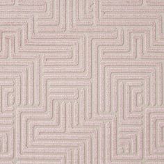 a pink rug with an abstract design on the top and bottom part of it's surface