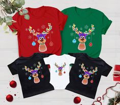 Reindeer Christmas Shirt, Peeping Reindeer Shirt, Christmas Lights Shirt, Merry Christmas Shirt, Christmas Family Shirt, Xmas Antler Shirt 🎀Welcome to the DerikoClothing! 👕🎁 BLACK TEXT is used for Yellow, Heather Peach, White, Athletic Heather, Mint, Pink, Baby Blue Shirts. Other colored shirts have white text. F I T ∙ & ∙ S I Z I N G : ✨Women's sizes are narrower than the waist. ✨Sleeves are rolled up in some product pictures. They do not come rolled up on delivery. T I M E ∙ T O ∙ D E L I V E R Y : ✨Processing and production time is 1-2 business days. I M P O R T A N T ∙ P L E A S E ∙ R E A D ∙ F U L L Y : ✨ Order cancellations are accepted for 2 hours after purchase. ✨For any questions, please contact me directly. It's my pleasure to assist you. Orders placed till 12 noon are shipped Baby Blue Shirt, Christmas Family Shirt, Reindeer Shirt, Christmas Party Shirts, Cute Christmas Shirts, Text Shirt, Merry Christmas Shirts, Family Christmas Shirts, Canvas Gift