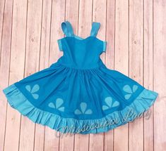 This is a little girl's Poppy troll inspired dress that is perfect for troll movie lovers. It is fun to wear because your child can twirl like a princess.  Flowers that trim the dress are embroidery stitched appliques that give its one of a kind look. Dress ties in the back.    It is made out of cotton fabric. Machine wash with like colors.   Made to order from a smoke free home.  Please message me with any questions prior to ordering. Princess Style Fitted Twirl Dress For Dress-up, Playful Fitted Princess Dress With Ruffles, Playful Fitted Twirl Dress For Play, Playful Fitted Ruffled Princess Dress, Whimsical Fitted Twirl Dress For Playtime, Fitted Fun Costume Dress, Fun Fitted Costume Dress, Fitted Playful Princess Dress For Playtime, Whimsical Summer Costume Dresses