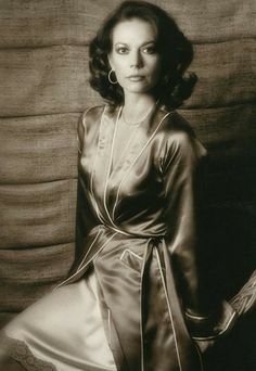 black and white photo of woman in satin dress