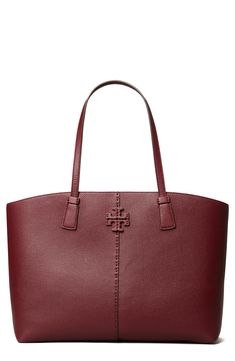 From its elongated handles to the stacked-T logo, the McGraw is the perfect-and spacious-tote for your busy lifestyle. Style Name:Tory Burch Mcgraw Leather Tote. Style Number: 6010725. Available in stores. Classic Tan Bags For Errands, Tan Textured Leather Bag For Errands, Classic Tan Tote Shoulder Bag, Tan Shoulder Bag With Leather Handles For Work, Tan Textured Leather Shoulder Bag For Shopping, Tan Tote Shoulder Bag For Work, Tan Tote Bag For Workwear, Tan Tote Bag For Work, Office-friendly Tan Tote Bag