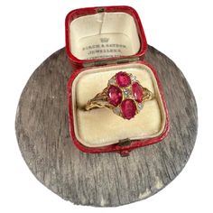 Antique Ruby & Diamond Ring 15ct Gold Stamped Circa 1880 Fabulous, Oval Shaped Victorian Ring. Set with Four Oval Shaped Rubies & Five Diamonds. Mounted on a 15ct Gold Band with Pretty, Split Shoulders. Face Of The Ring Measures Approx Height 11.5mm & Width 8.6mm UK Size N US Size 7 Can be resized using our resizing service, please contact us for more information. All of our items are either Antique, Vintage or Preloved. They are in used condition & may show some signs of age related wear, light Ruby Diamond Rings, Victorian Rings, Antique Boxes, Ruby Diamond, Jewelry Rings Engagement, Vintage Pink, Gold Bands, Style Vintage, Ring Verlobung