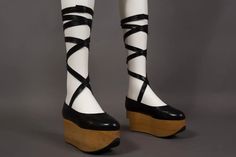 For Sale on 1stDibs - A rare pair of Vivienne Westwod black leather 'Rocking Horse' shoes with wooden platforms and extra long ankle straps, circa 1980s. Vivienne Westwood Boots, Vivienne Westwood Shoes, Kei Visual, Dr Shoes, Tabi Shoes, Wooden Shoes, Japanese Street Fashion, Rocking Horse, Ankle Straps