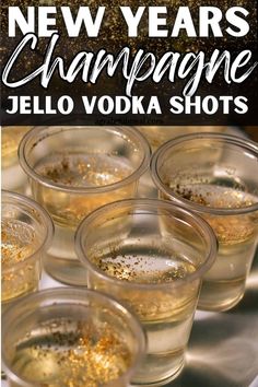 new year's champagne jello vodka shots in glasses on a tray with text overlay