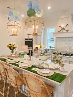 a kitchen filled with lots of food and balloons