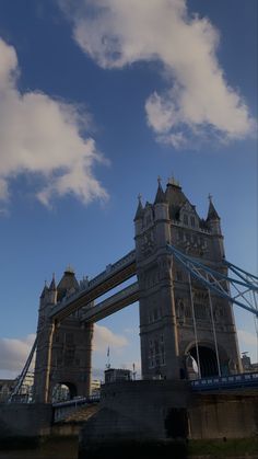 the tower bridge is very high in the sky