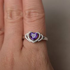 This is a gorgeous handmade creation. Its beauty is its simplicity & Elegance. The 6*6 mm heart cut faceted natural Amethyst is crafted in solid sterling silver and with rhodium plated. All item is sent in a beautiful gift box If you have any idea of design your ring,pls contact me directly. You can realize more lovely stuff clicking the link https://www.etsy.com/shop/knightjewelry?refshopsection_shophome_leftnav Please leave the correct address and you phone number for delivering successful Fine Jewelry Amethyst Heart Cut Birthstone Ring, Heart Cut Amethyst Birthstone Ring Fine Jewelry, Heart Cut Amethyst Ring With Accent Stones, Heart Cut Amethyst Jewelry With Center Stone, Heart Cut Amethyst Birthstone Jewelry, Fine Jewelry Amethyst Ring Heart Cut, Fine Jewelry Heart Cut Amethyst Ring, Amethyst Heart Cut Ring For Anniversary, Fine Jewelry Amethyst Ring For Anniversary On Valentine's Day