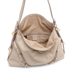 Beige leather shoulder bag from Givenchy. The Voyou medium shoulder bag is made of calf leather featuring both silver- and gold-toned hardware, an adjustable shoulder strap, complete with an internal pouch.Measurements: L40 x H27 x W6.5cmMade in Italy Beige Shoulder Bag, Leather Shoulder Bag, Givenchy, Calf Leather, Shoulder Strap, In Italy, Pouch, Shoulder Bag, Italy