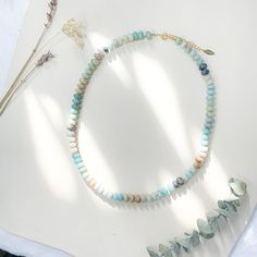 Smooth rondelle amazonite beads; our favorite earth shades in ombre. Trust in these tonal hues of Amazonite, used in jewelry dating back to Mesopotamia and ancient Egypt. Once considered one of the six most precious stones in Pharaonic Egypt, these sage to mint to aqua and sand stones are said to align our physical & astral bodies. They’ve been used throughout history in jewelry and artwork to signify joy, lush vegetation, fertility and rebirth. Connect with the energies within, said to enha Amazonite Gemstone Beaded Necklace, Amazonite Gemstone Beaded Necklaces With Round Beads, Amazonite Gemstone Beaded Necklace With Round Beads, Artisan Necklace With Amazonite Gemstone Beads, Handmade Amazonite Round Beads Necklaces, Artisan Amazonite Round Bead Necklace, Single Strand Amazonite Spiritual Beaded Necklace, Artisan Necklace With Natural Stones And Amazonite, Artisan Amazonite Necklace With Natural Stones