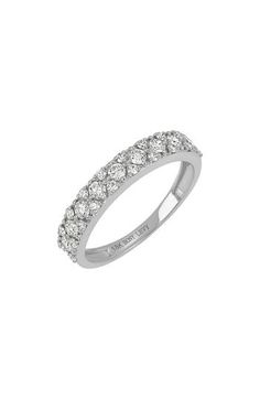 Shimmering pavé illuminates the band of this stackable band cast in dreamy 18-karat white gold. 1 1/4"W x 1/8"L setting Total diamond weight: 0.06ct. Color: G Clarity: VS 18k gold/diamond Imported >Diamond Guide Fine Jewelry White Gold Stackable Diamond Ring, Luxury Stackable White Gold Bands, White Gold Eternity Band With Pave Setting, Luxury White Gold Stackable Rings With Pave Setting, Luxury White Diamond Stackable Ring, Luxury Diamond White Stackable Rings With Pave Setting, Luxury White Gold Eternity Band With Pave Setting, Timeless White Gold Stackable Rings With Pave Setting, Luxury Stackable Platinum Rings