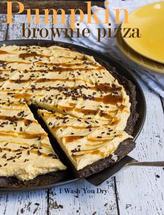 a pumpkin brownie pizza with one slice missing