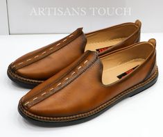 Step into a realm of timeless elegance and cultural richness with our Etsy collection featuring men's handmade ethnic tan color plan mojari-style shoes. Immerse yourself in the artistry of meticulously crafted footwear that seamlessly blends tradition and comfort, creating a truly exceptional and distinctive pair of shoes. Our commitment to quality craftsmanship is evident in every pair of mojari-style shoes we offer. Handmade with precision and care, these shoes are a testament to the skill of our artisans. The tan color, carefully chosen for its warmth and versatility, adds a touch of sophistication to the traditional design. Whether you're attending a cultural event, a festive celebration, or simply want to make a stylish statement, our mojaris are designed to be the perfect complement Traditional Leather Slip-ons For Formal Occasions, Traditional Brown Slip-on Loafers, Traditional Formal Loafers With Rubber Sole, Traditional Leather Sole Slip-on Loafers, Traditional Leather Slip-ons For Formal Wear, Traditional Round Toe Slip-ons For Formal Occasions, Traditional Formal Slip-ons With Round Toe, Traditional Formal Leather Shoes With Rubber Sole, Traditional Leather Shoes With Round Toe For Formal Occasions