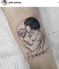 a woman holding a baby in her arms with the word pedia written on it