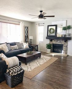 a living room filled with furniture and a fire place