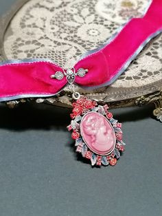 This Victorian inspired romantic pink  and light blue velvet choker supplemented with Victorian Ladies hand painted cameo pendant are very attractive and posh accents for your special occasions or summer wedding. Can be used as accessory for any kind of dresses - evening or casual, cocktail, sleeveless, long sleeve, bustier style dress or top. Also will look well with any kind of jackets. Detailed, hand crafted and carefully designed whit love and care! Height----1 inches (3 cm) Necklace length- Pink Ribbon Wedding Jewelry, Pink Choker For Valentine's Day Gift, Vintage Choker For Valentine's Day, Pink Vintage Choker Jewelry, Pink Ribbon Jewelry For Party, Vintage Pink Choker Necklace, Pastel Goth Choker, Cameo Choker, Pink Velvet Ribbon