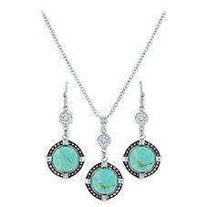 Montana Silversmiths\u00ae True North Turquoise Jewelry Set delivers the elegant beauty that only turquoise can provide. Reconstituted turquoise stones are surrounded by antiqued silver-finish pinpoints that hang from a single cubic-zirconia stone. Necklace uses a lobster clasp. Earrings hang from hypoallergenic stainless steel French hooks. Necklace chain length: 19". Necklace pendant: 1.15"L x 0.61"W. Earring pendant length: 1.15". Imported. \u000a \u000a Turquoise stones surrounded by antique Montana Silversmith Jewelry, Turquoise Jewelry Set, Turquoise Western, Elegant Beauty, True North, Necklace Chain Lengths, Turquoise Stones, Western Jewelry, Themed Jewelry