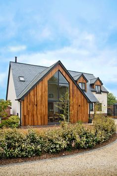 a house with a large garden in front of it