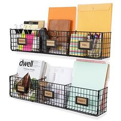 two black wire baskets filled with books and other office supplies on top of each other