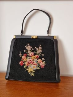 Description: Vintage Floral Tapestry Black Large Top Handle Handbag. Internal Attached Purse, Leather and Wool, Collector's Item. Measurements:   Width: 28.5cm, Height: 25cm, Bag to Strap: 17cm Vintage Tapestry Bag, Soft Gamine, Tapestry Bag, Top Handle Handbags, Vintage Tapestry, Floral Tapestry, Top Handle, Black Wool, Vintage Floral