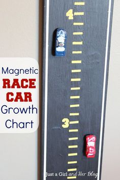 a wooden growth chart with cars on it and the words magnetic race car growth chart