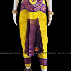 Design by Classical Dance Jewelry® ❥ Traditional Bharatanatyam costume wore during regular dance programs or arrangetram performance. ❥ Material : Art Silk ❥ Type : Traditional pant costume ❥ Easy to wear ❥ layer front fan ❥❥❥❥ 32 inch PANT LENGTH Dress Measurements ( all the measurements approximately 1 -2 margin buffer) Age: 9 - 12 yrs ❥ PANT MEASUREMENTS: ☛ Pant Length: 31-32 inch ☛ Pant Waist: 29-30 inch ☛ Pant Hip: 30-31 ❥ BLOUSE MEASUREMENTS: ☛ Blouse length: 11-12 inch ☛ Blouse Shoulder : Ceremonial Sets With Latkans For Navratri, Yellow Bollywood Churidar For Puja, Yellow Traditional Wear With Tilla For Navratri, Traditional Patterned Sets For Diwali Dance, Traditional Yellow Churidar For Navratri, Bollywood Style Ceremonial Churidar For Navratri, Yellow Sets For Ceremonial Navratri, Traditional Yellow Churidar For Transitional Season, Yellow Ceremonial Sets For Navratri